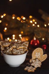 cookies in bowl near Christmas tree